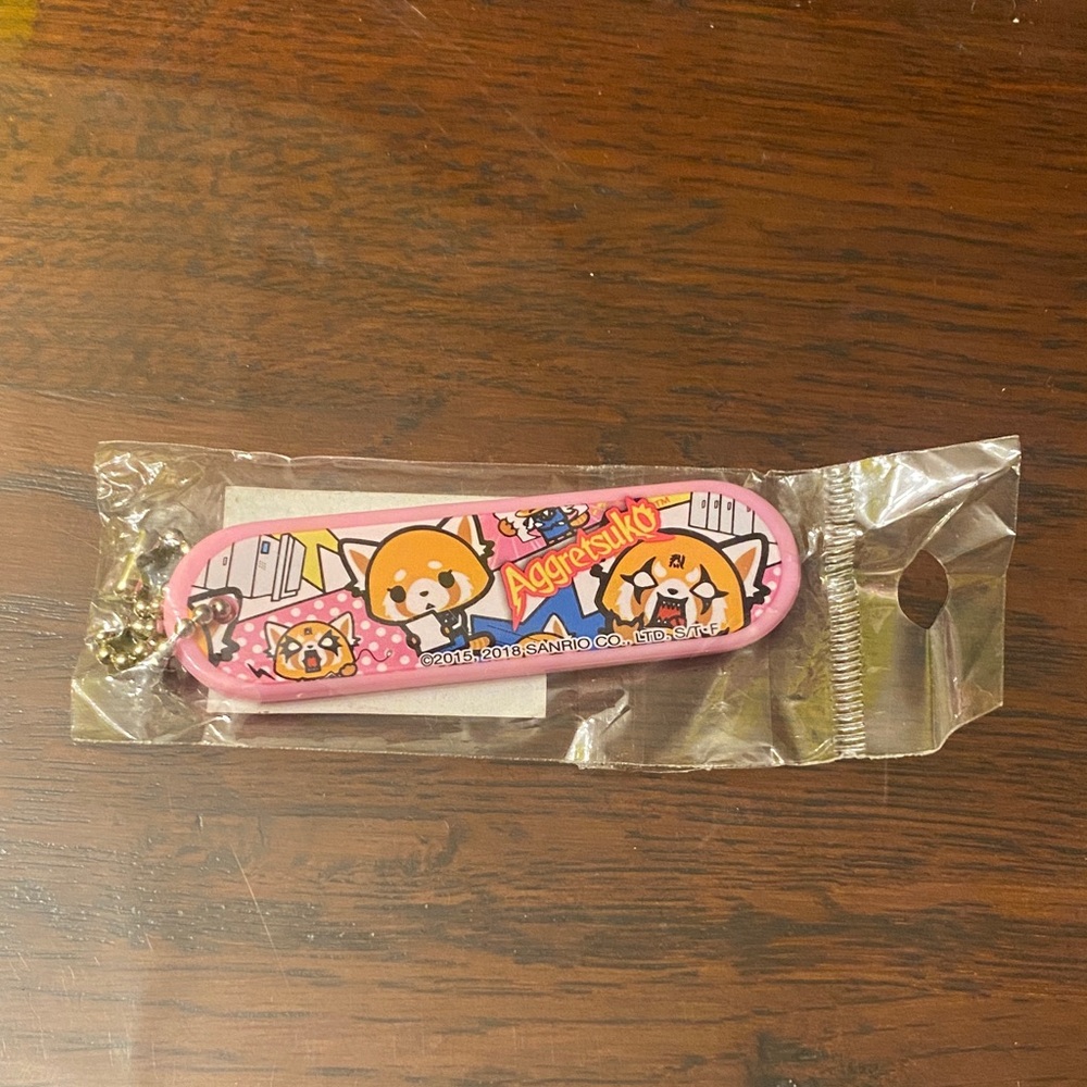 Sanrio Aggretsuko Pink and Silver Keychain